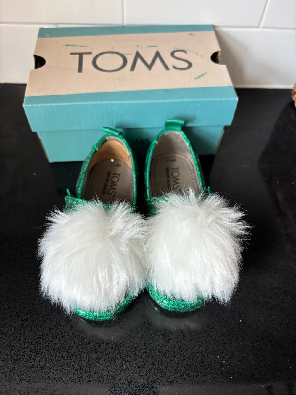Toms Kids Green Glitter Slip-On Moccasins with White Pom